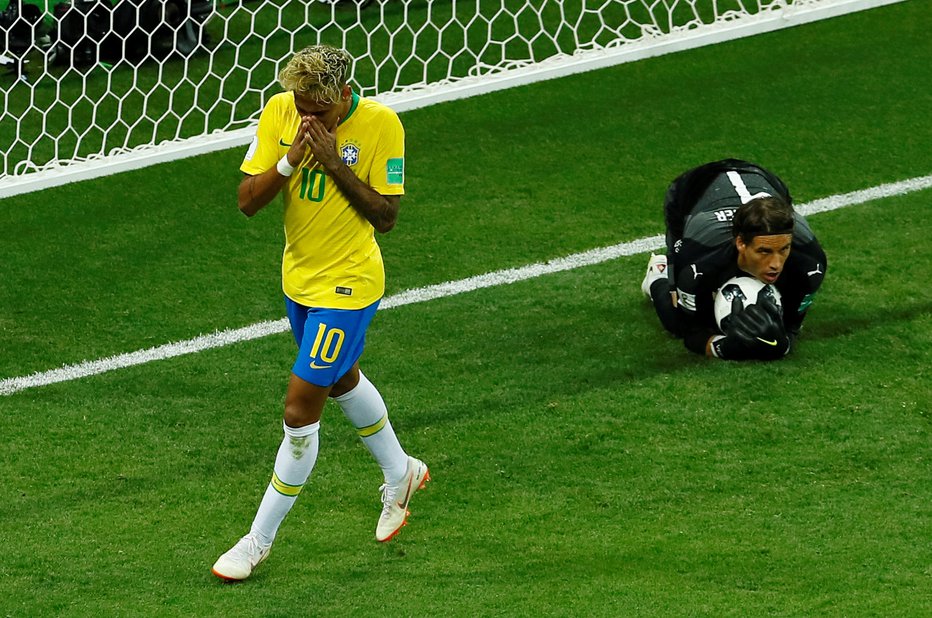 Fotografija: Brazilski zvezdnik Neymar v uvodni tekmi na SP ni mogel premagati obrambe Švice. Foto: Reuters
