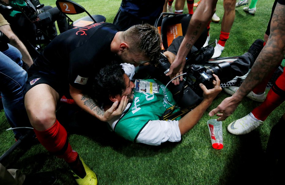 Fotografija: Mehiški fotograf Yuri Cortez in veselje hrvaških nogometašev. FOTO: Reuters