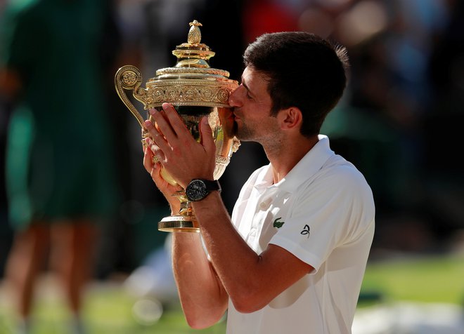 Novak  je četrtič osvojil Wimbledon. FOTO: Reuters