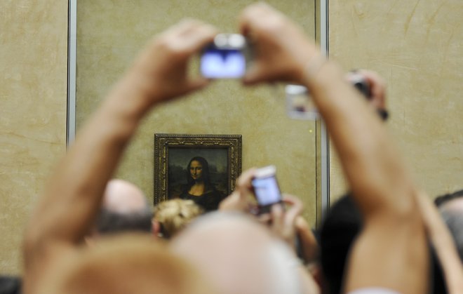 Najslavnejši portret na svetu je razstavljen v pariškem Louvru. Foto: Reuters