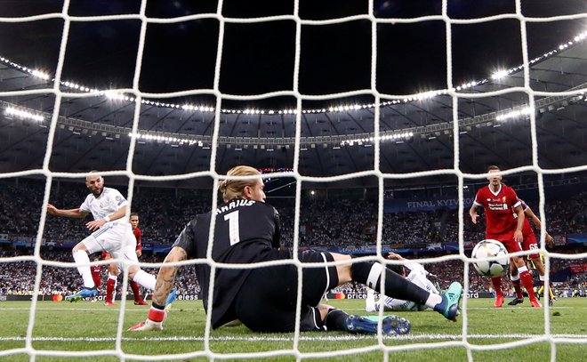 Benzema je dosegel prvi gol. FOTO: Andrew Boyers, Reuters