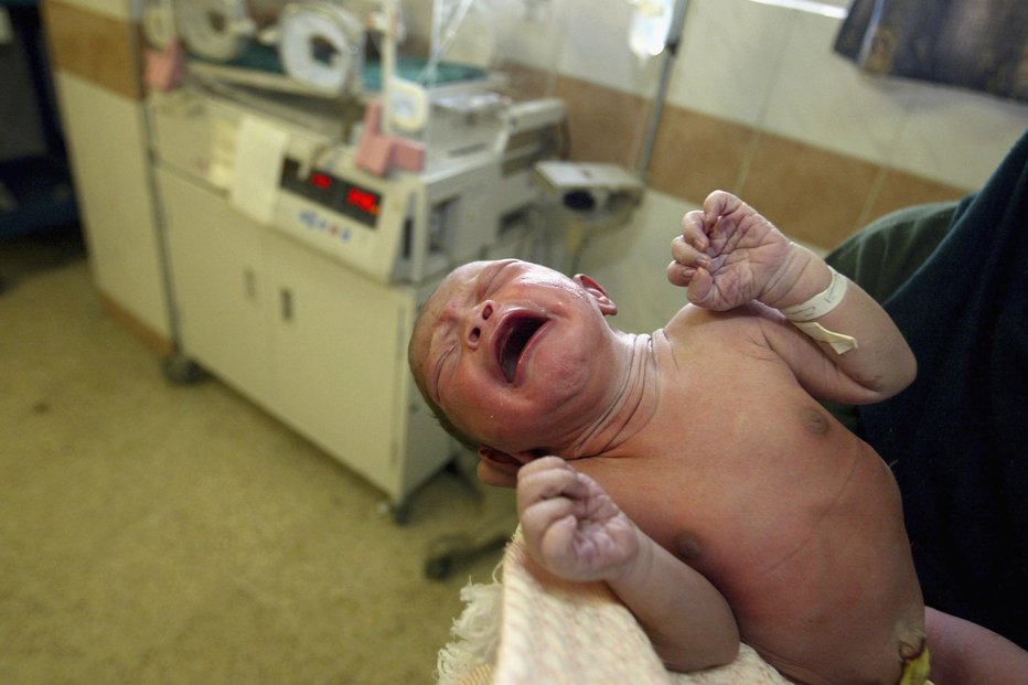 Fotografija: Po dveh dneh so ji dojenčka odnesli, za božič ga bo videla po 36 letih. FOTO: guliver/Getty Images