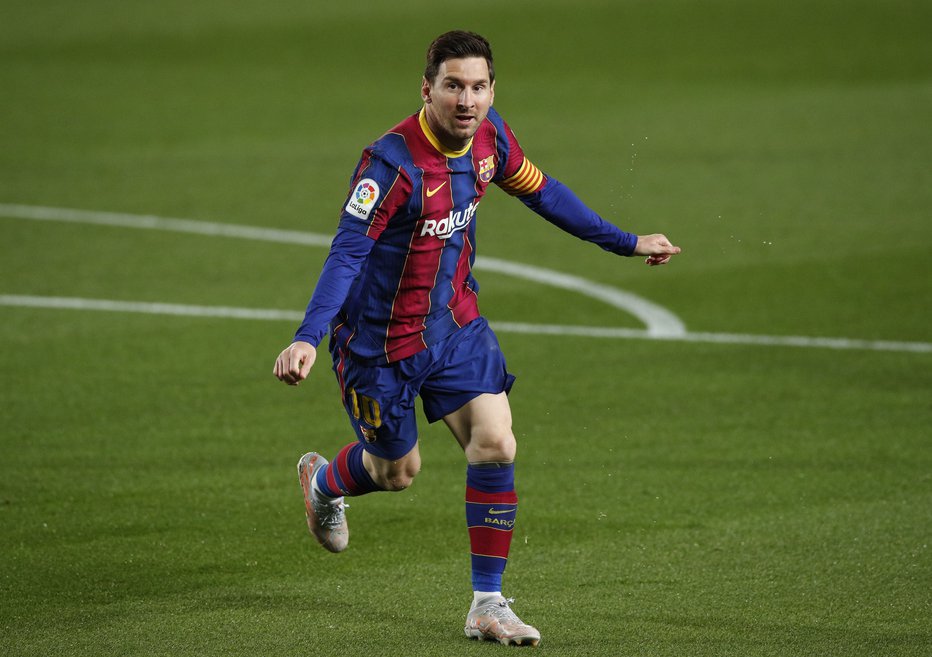 Fotografija: Lionel Messi je proslavil dva gola v mreži Getafeja. FOTO: Albert Gea/Reuters
