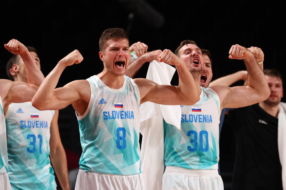 Fotografija: Slovenski košarkarji so tudi najboljšim na svetu pokazali zobe in mišice. FOTO: Brian Snyder/Reuters

