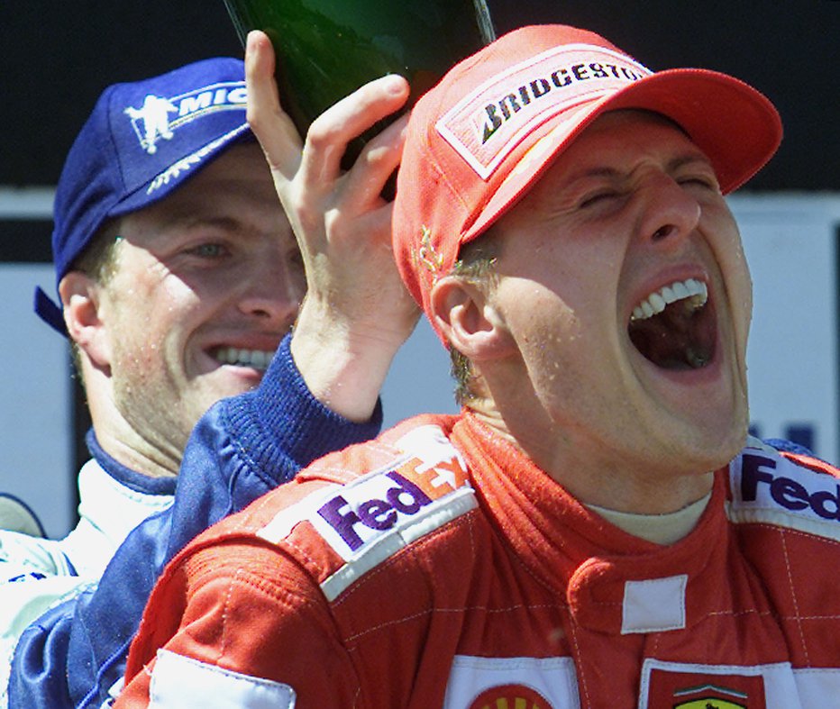 Fotografija: Ralf Schumacher (levo) in Michael Schumacher. FOTO: Yves Herman, Reuters