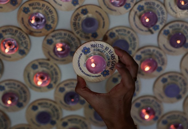 Prižgali so 239 sveč. FOTO: Hasnoor Hussain Reuters
