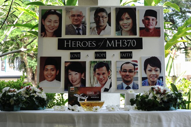 Posadka pogrešanega letala MH370 družbe Malaysia Airlines. FOTO: Mohd Rasfan Afp