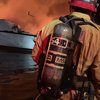 V požaru v Medulinu zgorelo najmanj 22 čolnov, ljudje skakali v morje