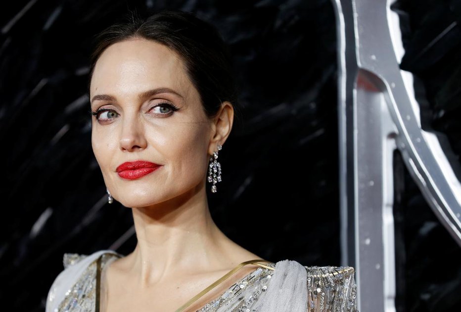 Fotografija: Angelina Jolie naj bi pihala od jeze zaradi Brada Pitta in Jennifer Aniston. FOTO: Reuters Pictures