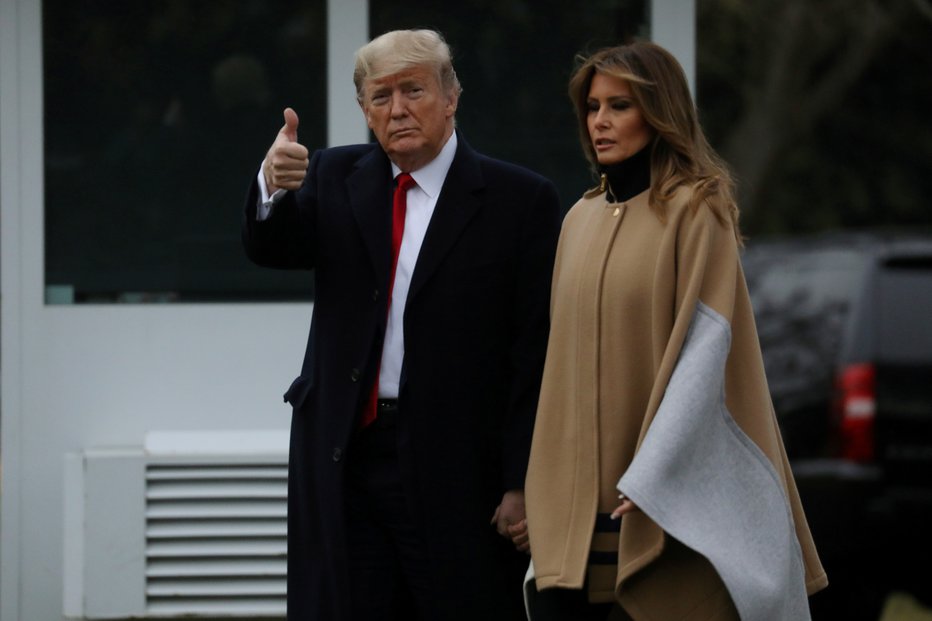 Fotografija: Donald Trump z ženo Melanio. FOTO: Reuters