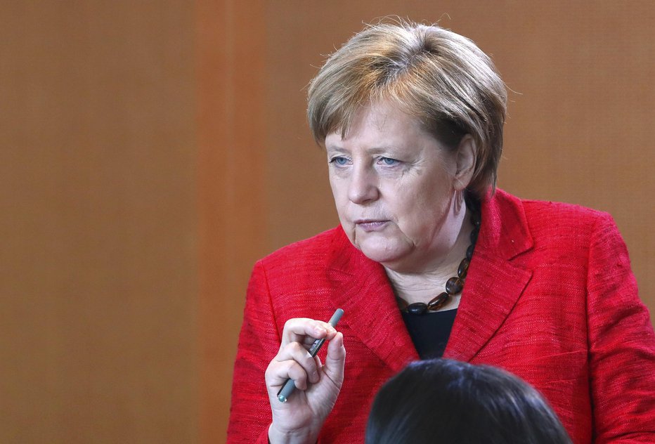 Fotografija: Angela Merkel je bila, potem ko je zbolel njen zdravnik, tudi sama testirana na novi koronavirus. FOTO: Reuters