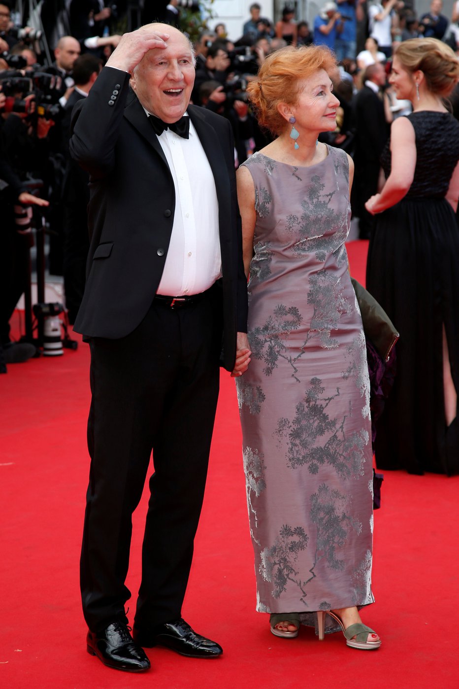 Fotografija: Igralec Michel Piccoli z ženo na rdeči preprogi. FOTO: Benoit Tessier, Reuters