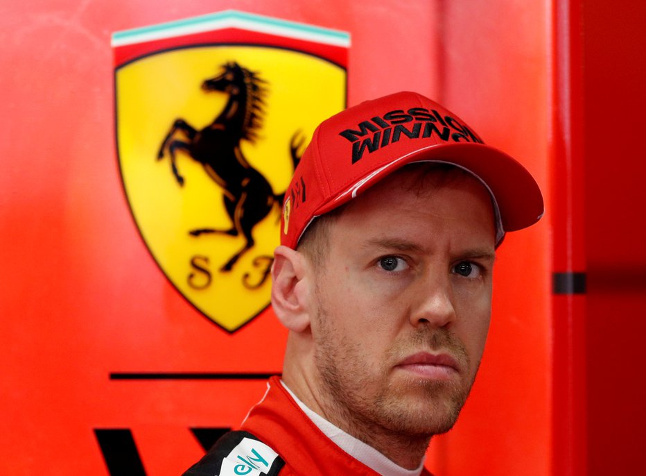 Fotografija: Sebastian Vettel se bo po koncu sezone poslovil od Ferrarija. FOTO: Albert Gea/Reuters