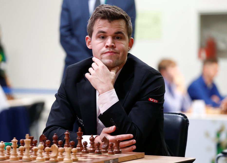 Fotografija: Magnus Carlsen dokazuje kakovost svetovnega prvaka. FOTO: Anton Vaganov/Reuters