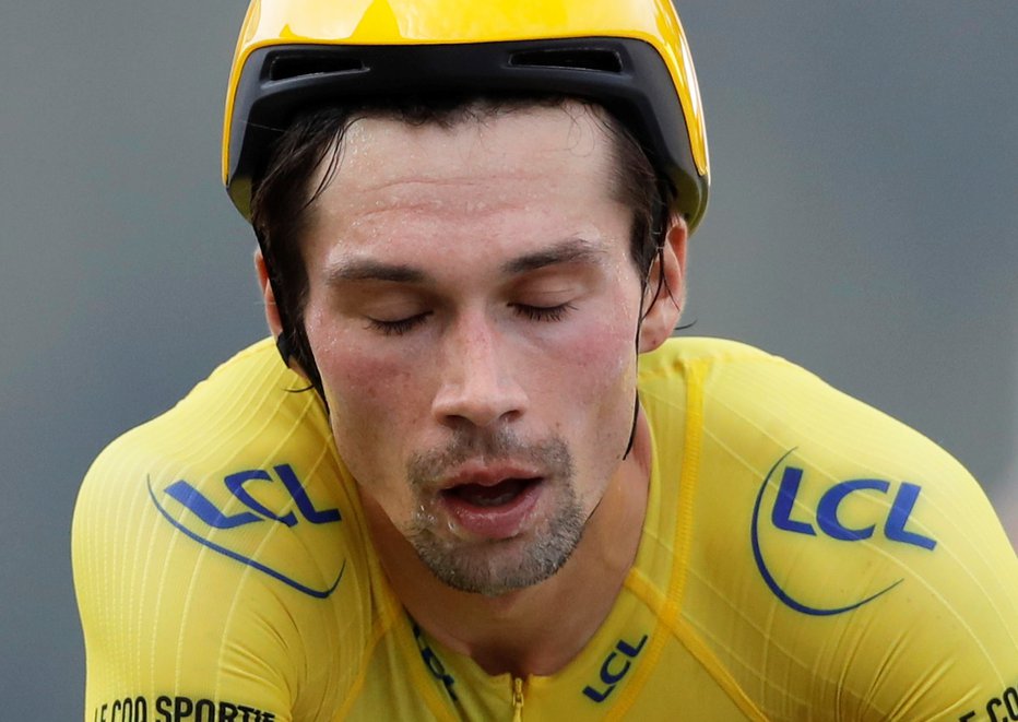 Fotografija: Primož Roglič, najboljši kolesar Mednarodne kolesarske lestvice, o spletni prevari. FOTO: Christophe Ena, Reuters
