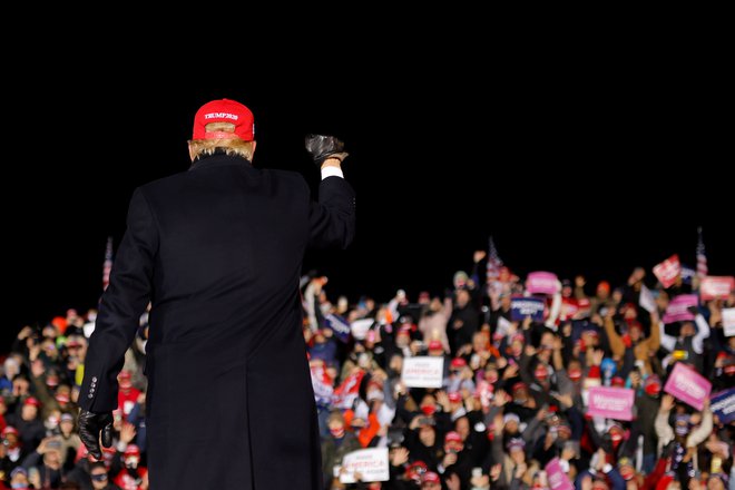 Donald Trump na zborovanju v Michiganu. FOTO: Carlos Barria, Reuters
