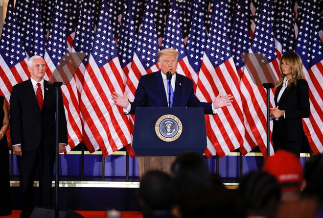 Donald Trump in Melania Trump. FOTO: Carlos Barria, Reuters