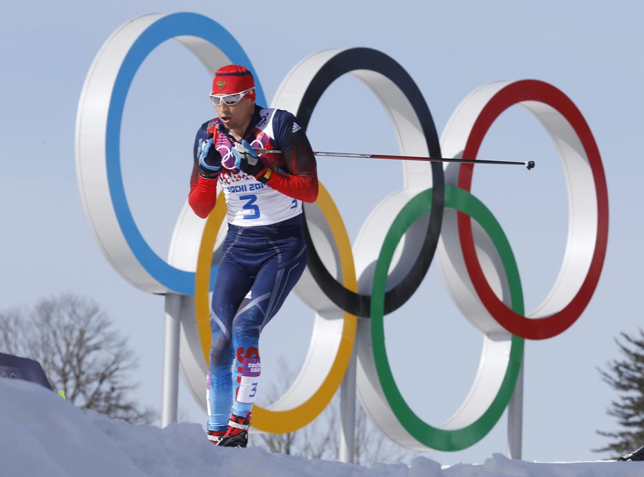 Fotografija: Pri Mednarodnem športnem razsodišču menijo, da je Aleksander Legkov v Sočiju športno osvojil zlato olimpijsko kolajno v teku na 50 km. Foto: AP