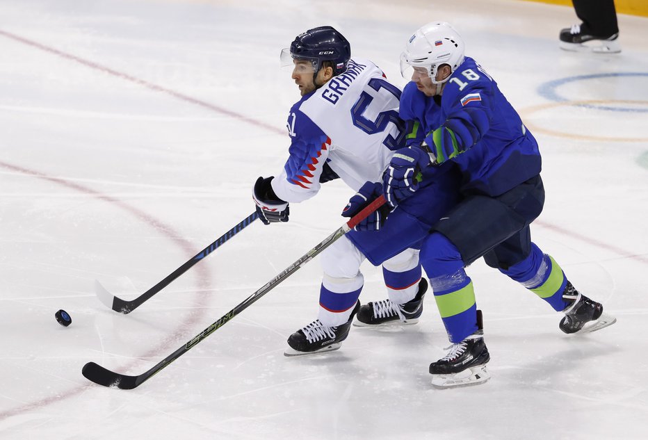 Fotografija: Hokej Slovenija : Slovaška. FOTO: Reuters