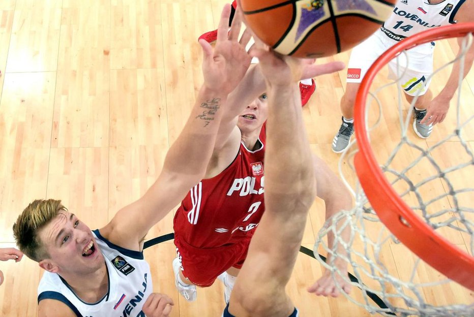 Fotografija: Slovenija bo v prihodnje nastopala v močnejši zasedbi, a zagotovo brez Luke Dončića, ki se seli v ligo NBA. FOTO: Reuters