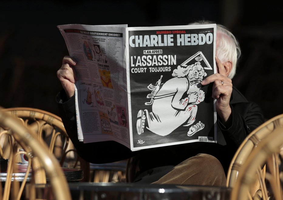 Fotografija: Teroristični napadi so sprožili burne in glasne razprave o svobodi govora, a tudi kritike karikatur. FOTO: Eric Gaillard/Reuters