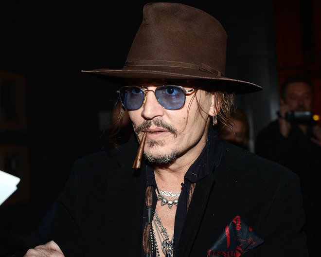 Johnny Depp se predaja glasbenim vodam. FOTO: Guliver/Cover Images