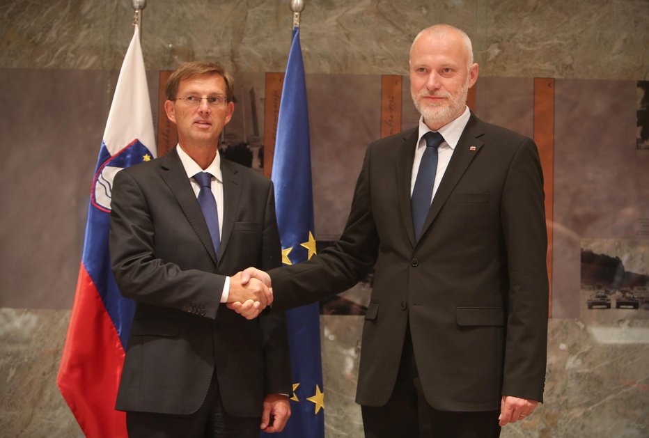 Fotografija: Novi predsednik vlade Miro Cerar in predsednik DZ, Milan Brglez po po prisegi v Ljubljani 25.avgusta 2014. FOTO: Jure Eržen/Delo