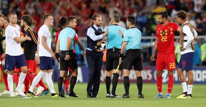 Soccer Football - World Cup - Group G - England vs Belgium - Kaliningrad Stadium, Kaliningrad, Russia - June 28, 2018   England manager Gareth Southgate shakes hands with the match officials after the match     REUTERS/Marko Djurica