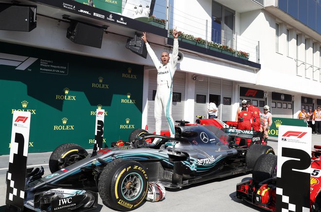 Lewis Hamilton je zmagal. FOTO: Ap