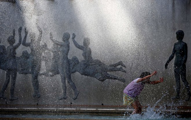 Voda ohladi. FOTO: Kim Kyung-hoon, Reuters
