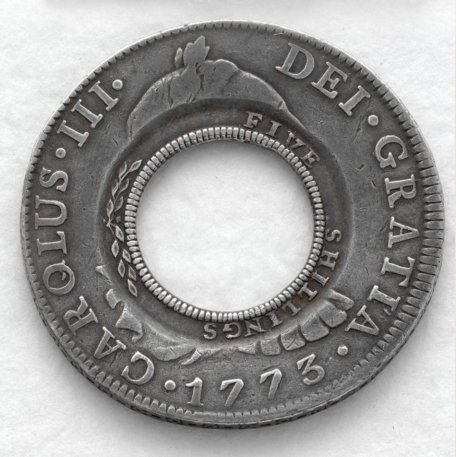 Veliko so vredni tudi kovanci, imenovani avstralski dolarji z luknjo. FOTO: Wiki