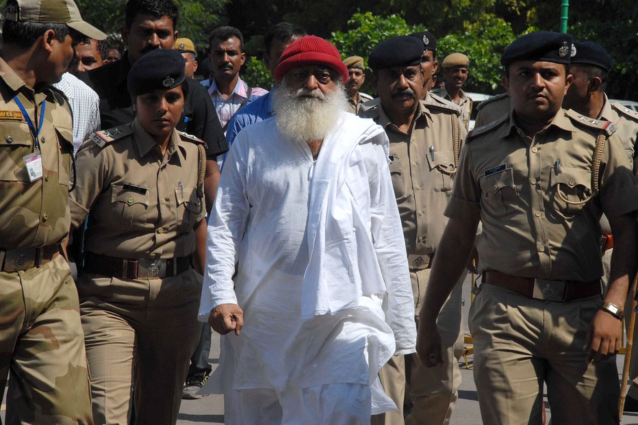 Fotografija: Guru se bo moral zagovarjati še zaradi drugih zločinov. FOTO: AFP