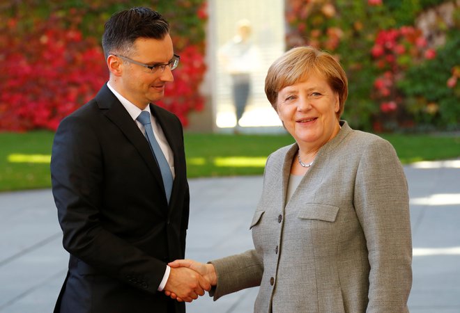 Nemška kanclerka Angela Merkel in slovenski predsednik vlade Marjan Šarec. FOTO: Reuters