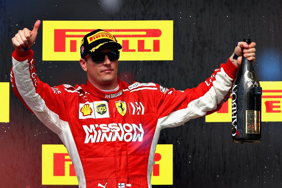 Fotografija: Kimi Räikkönen je po petletni suši spet okusil slast zmage v formuli 1. FOTO: AFP