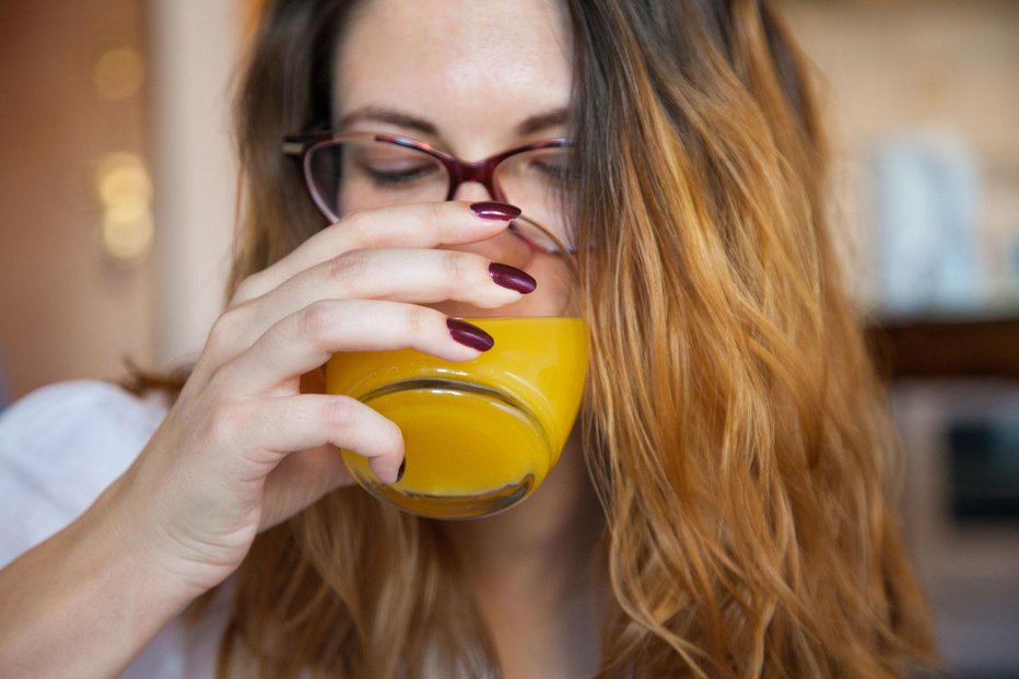 Fotografija: V pomarančnem soku prisoten vitamin D pripomore k boljšemu razpoloženju. FOTO: Thinkstock