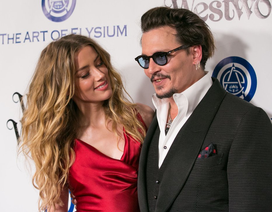 Fotografija: Johnny Depp vrača udarec nekdanji ženi Amber Heard. FOTO: Bt1 Brian To/wenn.com