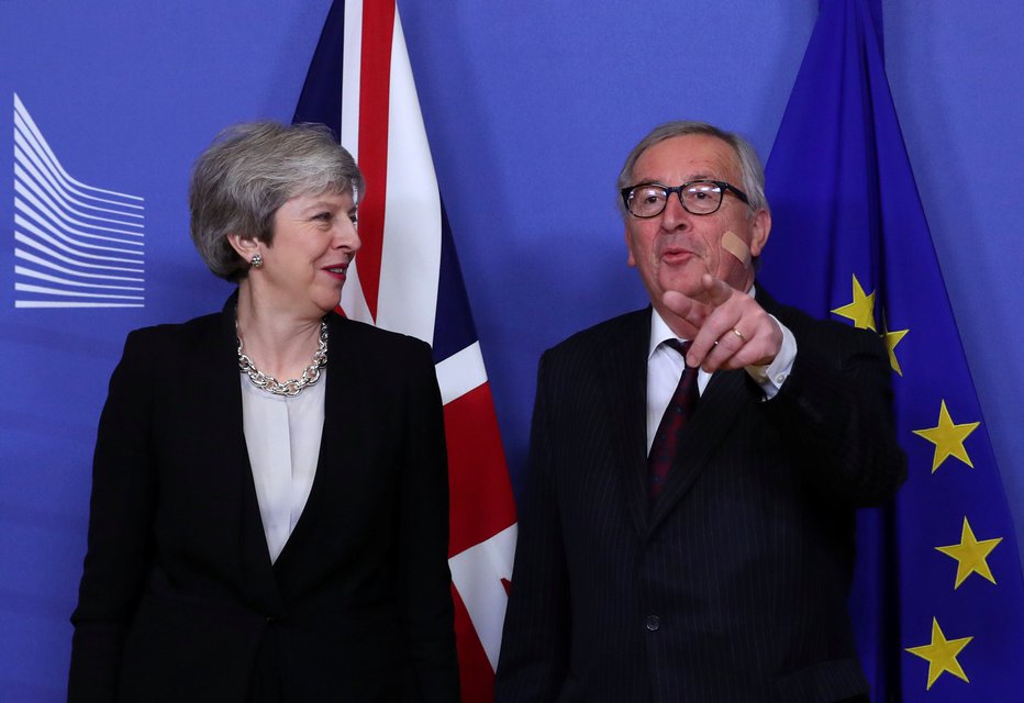 Fotografija: Theresa May in Jean-Claude Juncker. FOTO: Reuters