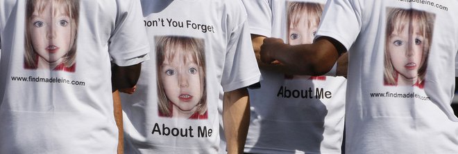 Medeleine McCann je bila povsod: na majicah, zaslonih, plakatih, letakih, zataknjenih za vetrobransko steklo ... FOTO: Reuters