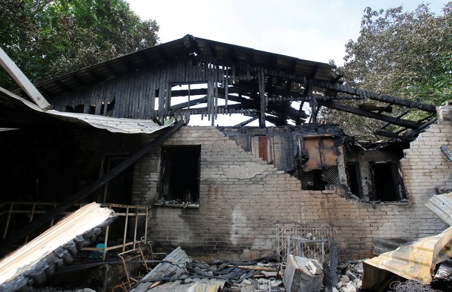 Požar v psihiatrični kliniki. FOTO: Reuters