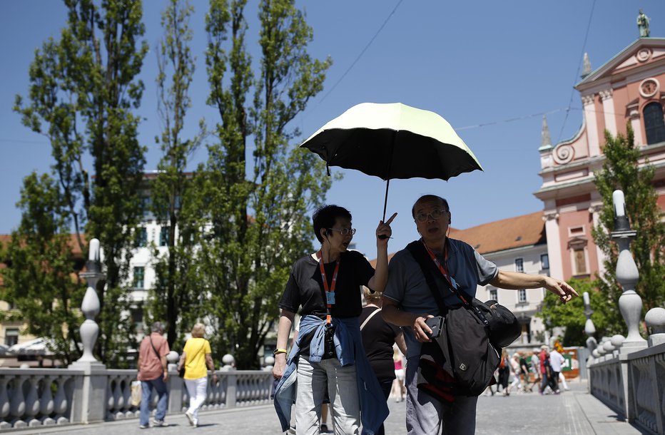 Fotografija: 27. junija popoldne so v več krajih po Sloveniji zabeležili najbolj vroče junijsko popoldne v zadnjih 70 letih. FOTO: Blaž Samec