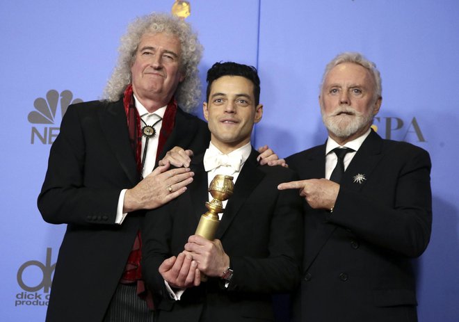 Brian May in Roger Taylor sta ponosna na film in glavnega igralca. FOTO: Reuters