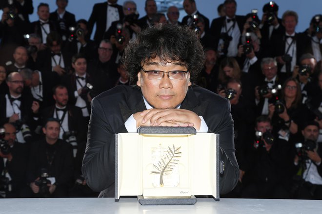 Predlani je v Cannesu slavil Bong Joon-ho, ki je s filmom Parazit nato blestel tudi na oskarjih. FOTO: Pascal Le Segretain/Getty Images