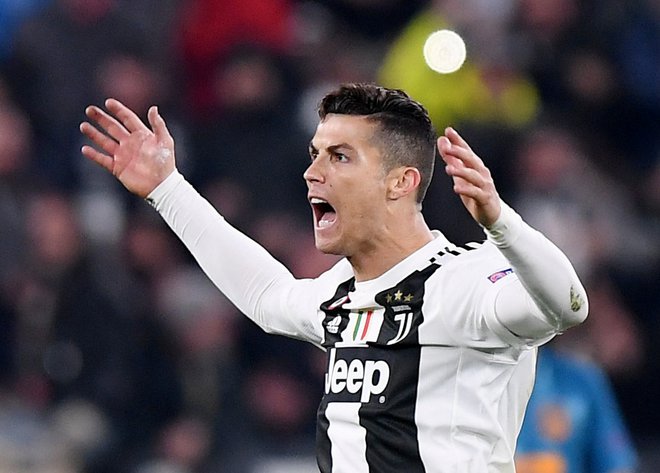 Cristiano Ronaldo je v osmini finala s tremi doseženimi goli izločil Atletico Madrid. FOTO: Reuters