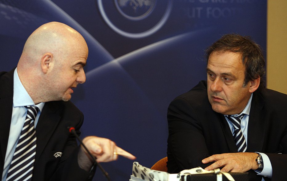 Fotografija: Gianni Infantino (levo) in Michel Platini sta tarči hudih obtožb. FOTO: Reuters