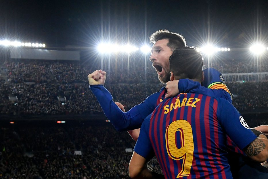 Fotografija: Liverpool sta preluknjala odlična napadalca in velika prijatelja Lionel Messi in Luis Suarez. FOTO: AFP