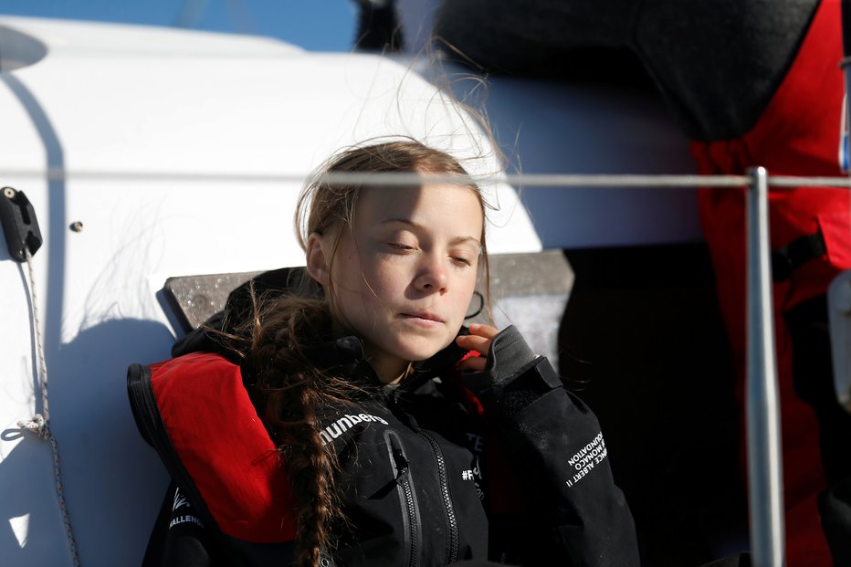 Fotografija: Po 20 dneh plovbe je Greta Thunberg prišla do Lizbone. FOTO: Rafael Marchante/Reuters
