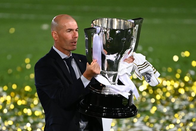 Realov trener Zinedine Zidane je z osvojenim španskim prvenstvom sezono že naredil zelo uspešno, toda uspeh kluba v ligi prvakov bi mu prišel še kako prav. FOTO: Gabriel Bouys/AFP