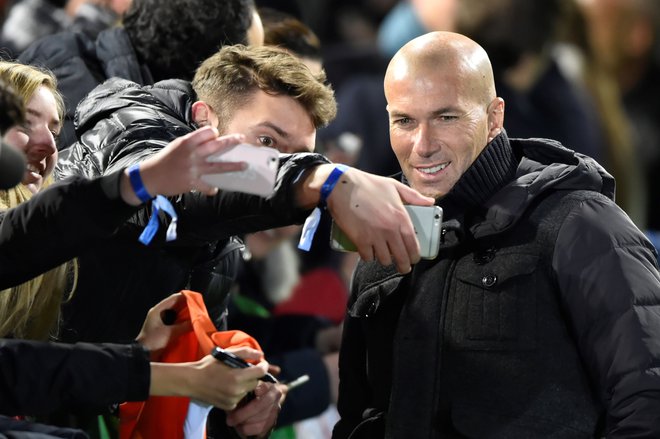 Zinedine Zidane ima močan ego, ki bi ga znal stati službe. FOTO: Michael Buholzer/AFP