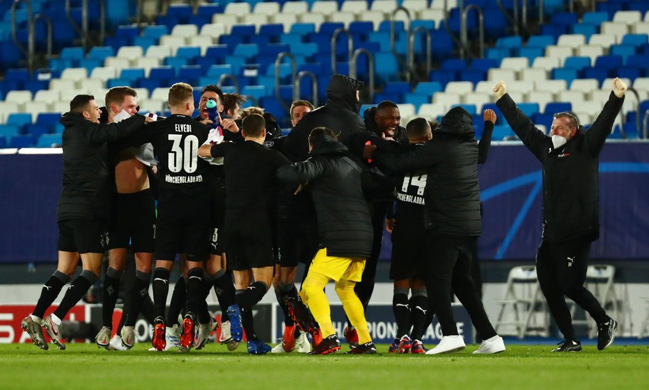 Fotografija: Borussia je izgubila proti Realu, vendar pa ji to ni pokvarilo veselja ob napredovanju. FOTO: Sergio Perez/Reuters
