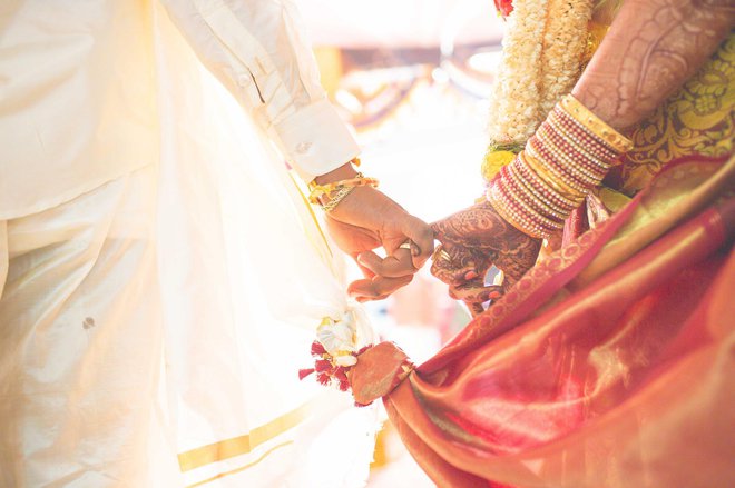 Svatba se je nadaljevala na kopnem. FOTO: Anitha Devi/Getty Images